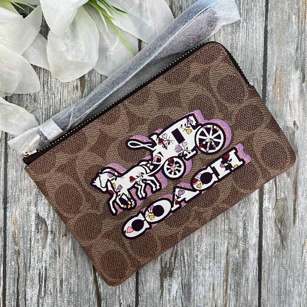 Coach Corner Zip Wristlet In Signature Canvas With Horse And Carriage Print Bag